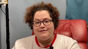 Screenshot of a female patient from a video review
